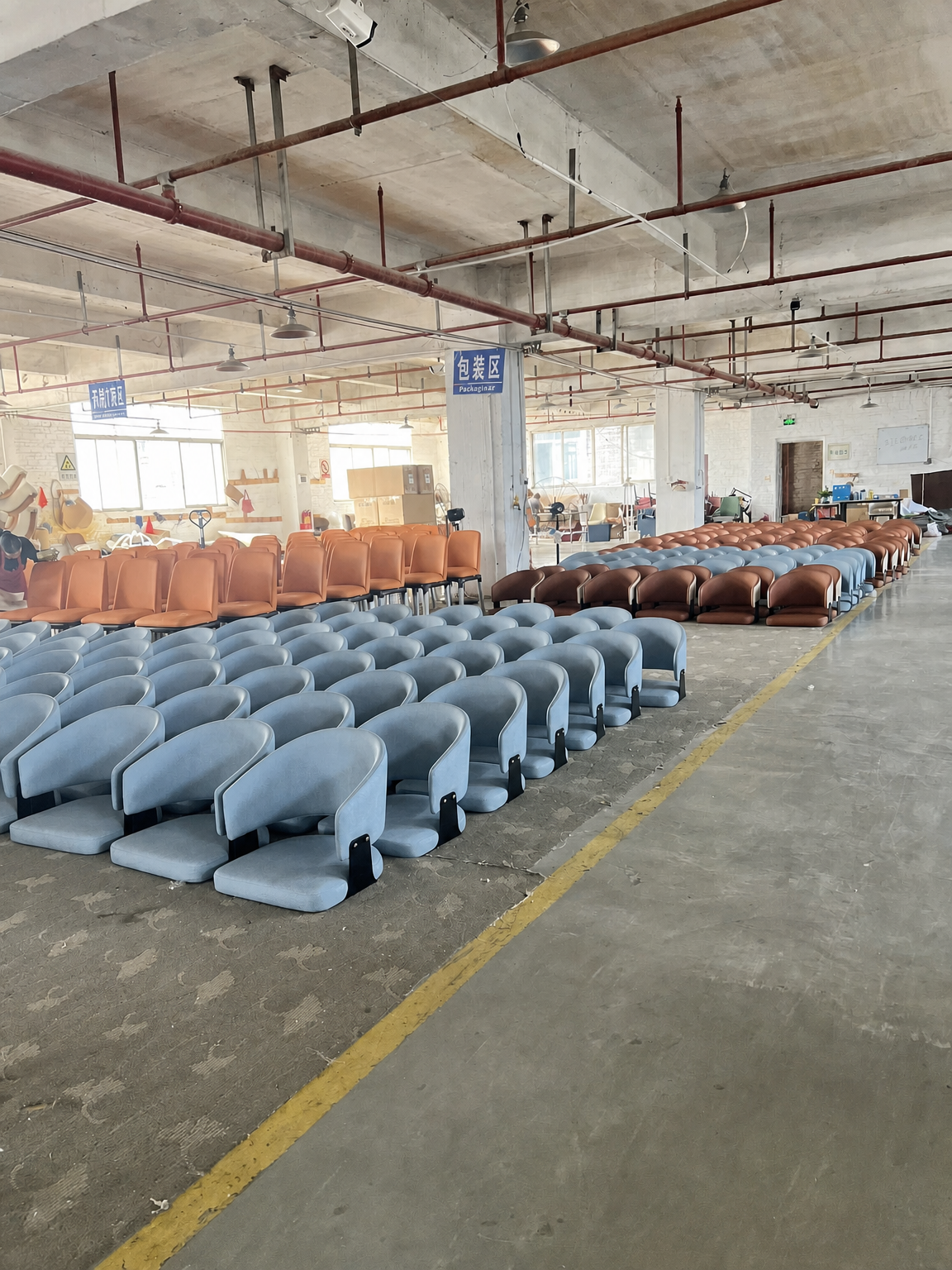 Powder blue and warm brown upholstered chairs arranged for a hospitality furniture project